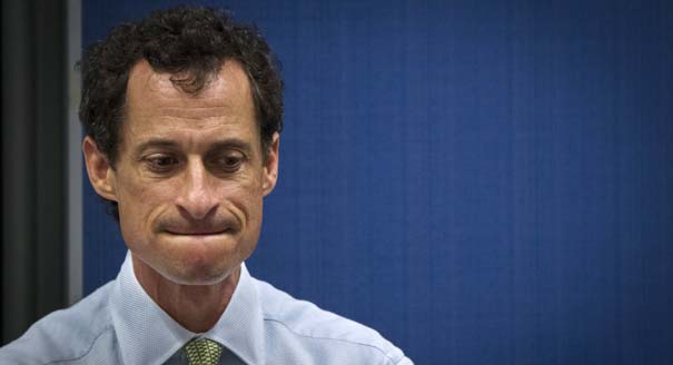 Candidate for New York City Mayor Weiner listens to fellow candidates at a debate in New York